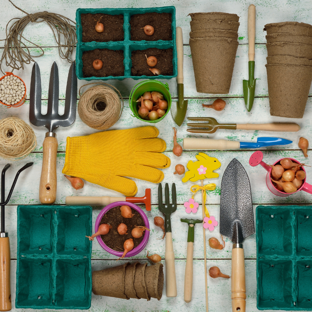 Flat lay of various gardening tools